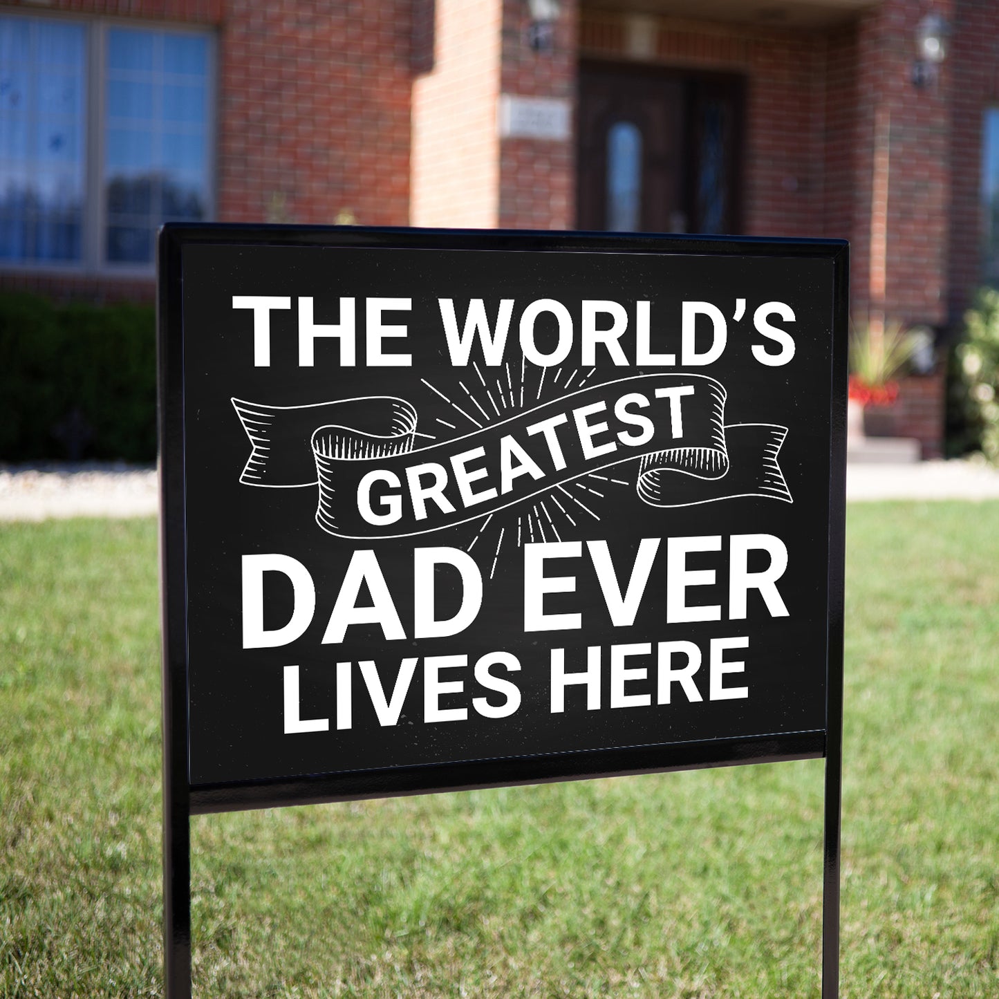 The World's Greatest Dad Lives Here Yard Sign